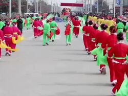 MS Villagers performing yangko dance in traditional festive folk celebration or carnival during chinese spring festival  AUDIO  / xi'an, shaanxi, china Stock Footage