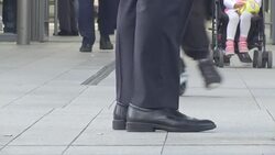 Anonymous Commuters and City Workers Walking Down Street News Clip