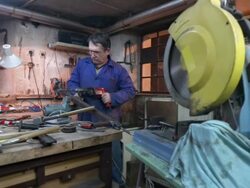 HD DOLLY: Toolmaker Drilling In His Workshop Stock Footage