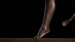 SLO MO Legs at back walkover on balance beam Stock Footage