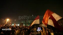 Protesters Marching in Tahrir Square at Night News Clip