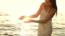 HD Super Slow-Mo: Woman Having Fun Splashing Water Stock Footage