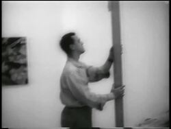 B/W 1959 PAN three men installing painting in Guggenheim Museum / NYC / newsreel Stock Footage