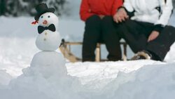 HD Super Slow-Mo: Loving Couple Looking At The Snowman Stock Footage