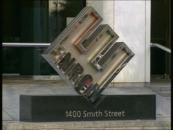 2002 medium shot Enron logo outside corporate headquarters / Houston, Texas Stock Footage