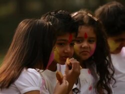 Group of kids eating gujia in holi festivals Stock Footage