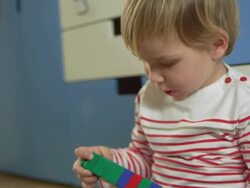 Little Boy Stacking Blocks Together Stock Footage
