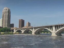 WS Shot of  Skyline and  St Anthony Falls  / Minneapolis, Minnesota, United States  Stock Footage