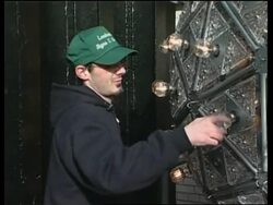 Workers installing final light bulbs for New Year's Eve Ball News Clip