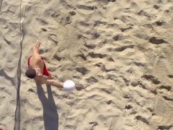 HD Super Slo-Mo:Shot of Young Man Playing Beach Volley Stock Footage
