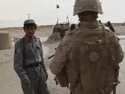 WS PAN Soldier holding rifle / Musa Qala, Helmand Province, Afghanistan. Stock Footage