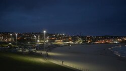 Bondi Beach at nightfall, Sydney Australia Stock Footage