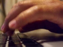 CU Shot of man's hands typing on laptop computer / Fayetteville, North Carolina, United States Stock Footage