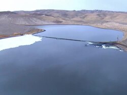 WS AERIAL ZI CU View of negev industries with evaporation ponds / Negev, Israel Stock Footage
