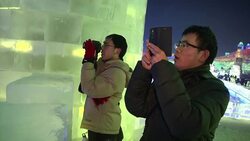 Tourists from all over the world visit ice and snow festival News Clip