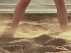 Track and field athlete in slow motion doing long jump Stock Footage