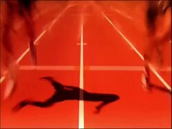 CU T/L athletes feet running down track, Australia Stock Footage