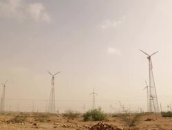 Wind turbine on desert, Jaisalmer, Rajasthan, India Stock Footage