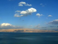 WS T/L View of clouds moving above dead sea region / Ein Gedi , Judean Desert , israel Stock Footage