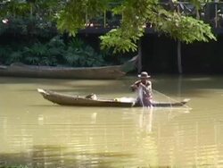 Man Fishing With Net Stock Footage