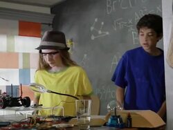 MS PAN TD Cute teenage boys and girl making engineering race car model at home while learning and having fun / Pasadena, California, United States   Stock Footage