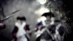 Soldiers in French Revolution uniforms run with bayonets across a battlefield. Stock Footage