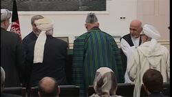 Presidential candidates finally sign power-sharing deal, Karzai reax News Clip