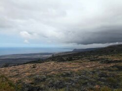 MS T/L Shot of clouds moving over field on side of volcano in Volcanoes National Park / Volcano, Hawaii, Big Island, United States   Stock Footage