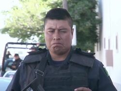 April 9 2009 CU TU ZI Federal police officers, Juarez, Chihuahua, Mexico, AUDIO Stock Footage