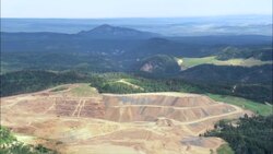 mine in green landscape - Aerial View - South Dakota,  Lawrence County,  United States Stock Footage