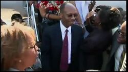 Former president Aristide arrives back in Haiti, supporters Instructional Video