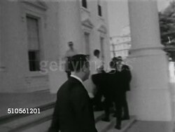 1965: CURRENT SENATOR LONG: Senator Russell B. Long w/ other Senators. President Lyndon B. Johnson walking from podium, shaking hands w/ Russell. WS TRACKING Russell walking down Capitol steps, to car, talking w/ men in office. Instructional Video