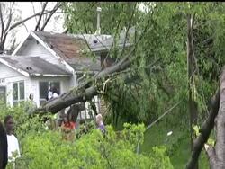Tornadoes ripped through parts of the Midwest on Sunday killing at least one person in Minneapolis and injuring at least 29.  (May 23) News Clip