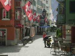 Zurich, Augustinergasse, Swiss flags Stock Footage