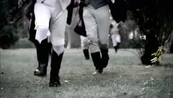 Soldiers in French Revolution uniforms charge across a battlefield. Stock Footage