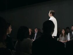 MS DS PAN Male model walking down catwalk during fashion show  Stock Footage
