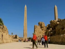WS PAN Tourist walking near Hatshepsut's Obelisk at Karnak / Luxor, Egypt Stock Footage