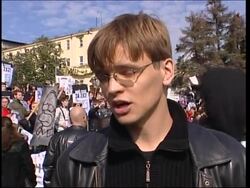 Rally in support of embattled TV station showing US cartoons News Clip