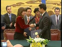 French cash registers ringing in China News Clip