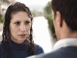 HD Super Slow-Mo: Serious Couple In The Rain Stock Footage