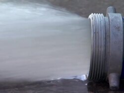 Water sprays from a sewer pipe. Stock Footage