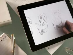 Tablet drawing dollars Stock Footage