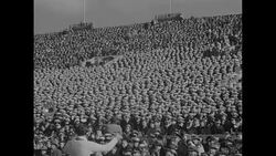 Navy midshipmen sing 'Army Mule' song at 1945 Army-Navy football game News Clip