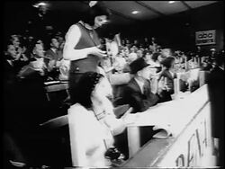 B/W 1965 judges + audience clapping at World Figure Skating Championships / Colorado / newsreel Stock Footage