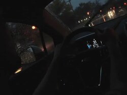 CU POV ZO Driver behind wheel of electric car during evening hours / Rochester, Michigan, United States Stock Footage