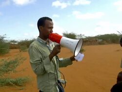 UN officer with loudspeaker Stock Footage