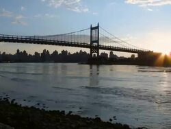 WS T/L T/Liew of Bridge with river from day to night / New York, United States  Stock Footage