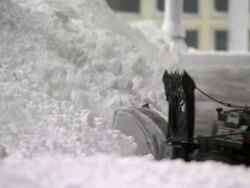 Snowblower working on big drift Stock Footage