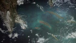 A fiery meteor races through the sky and hurtles toward the earth in a computer generated animation. Stock Footage