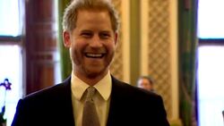 Prince Harry chats to guests, including Adam Hills, at the reception for Rugby League World Cup 2021 draws at Buckingham Palace News Clip